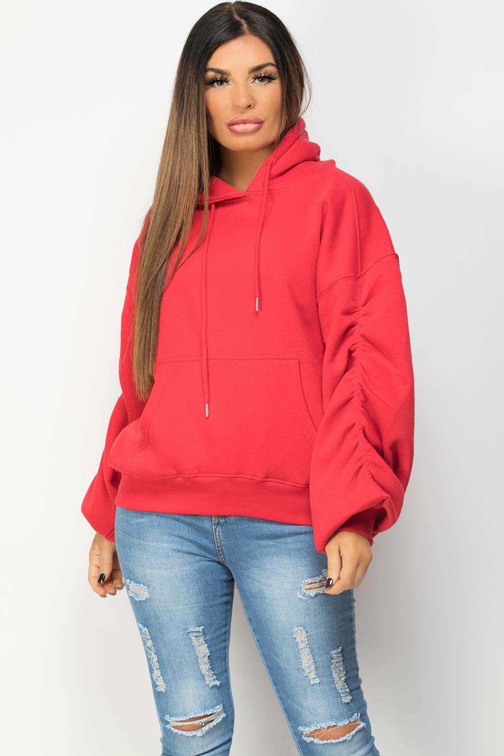 red hoodie with ruched sleeves