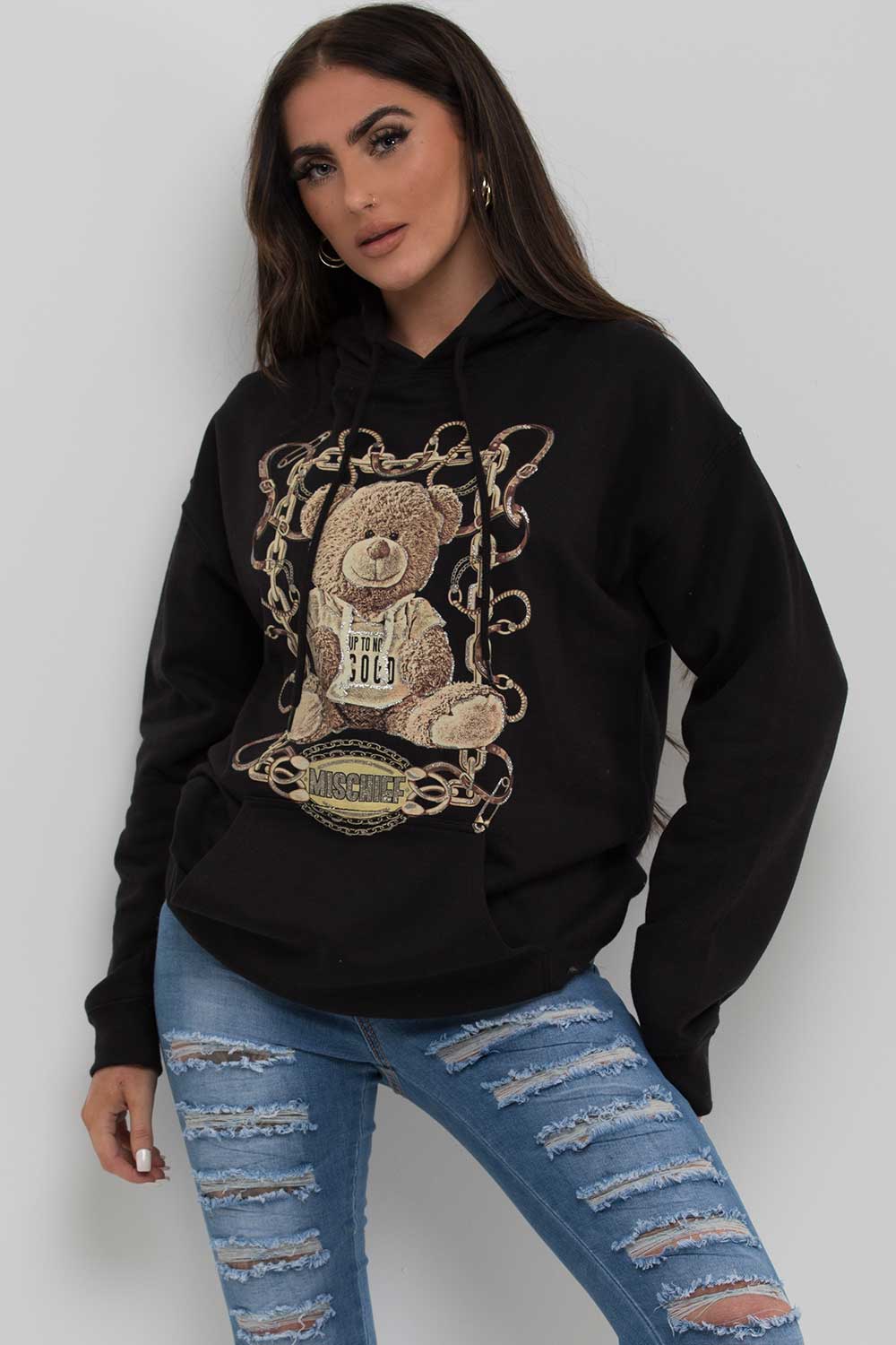 black oversized hoodie with mischief teddy bear slogan