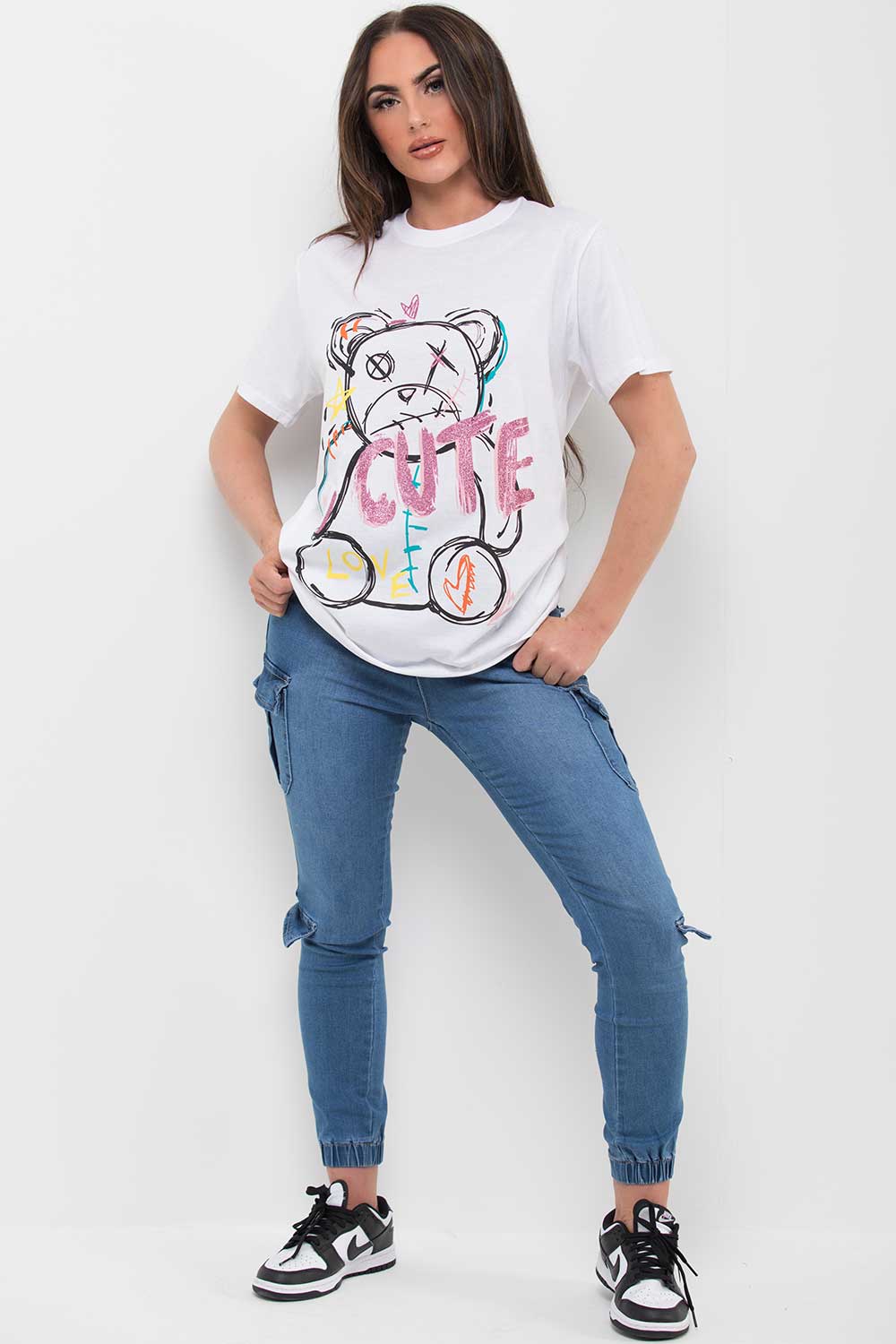 white t shirt with teddy bear graphic