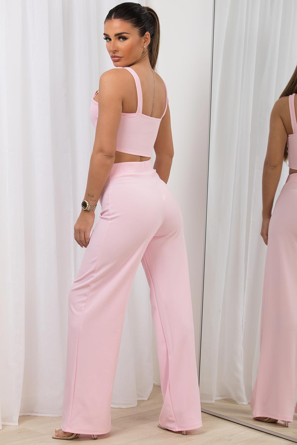 gold chain crop top and high waisted wide leg trousers co ord set