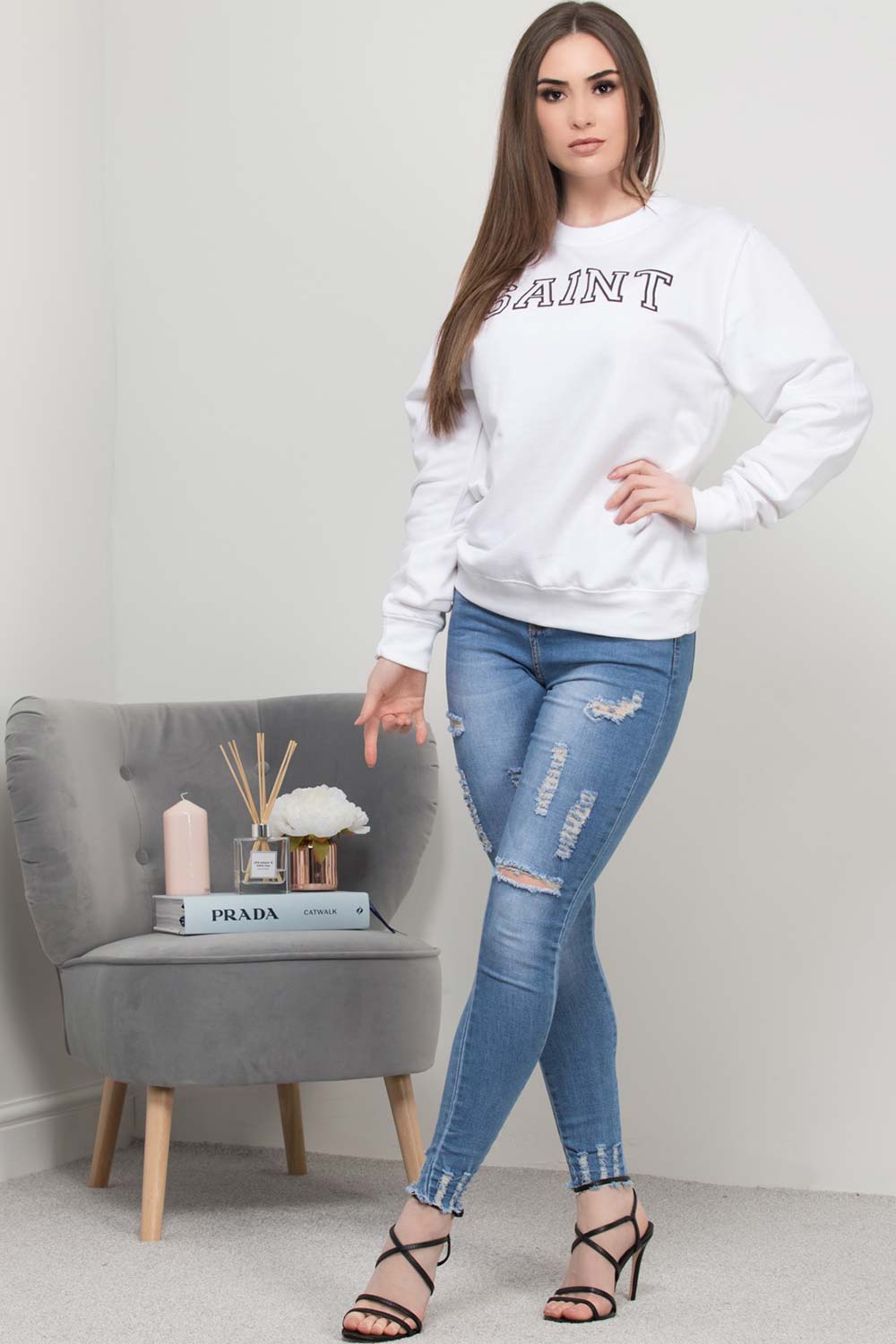 womens white sweatshirt saint slogan