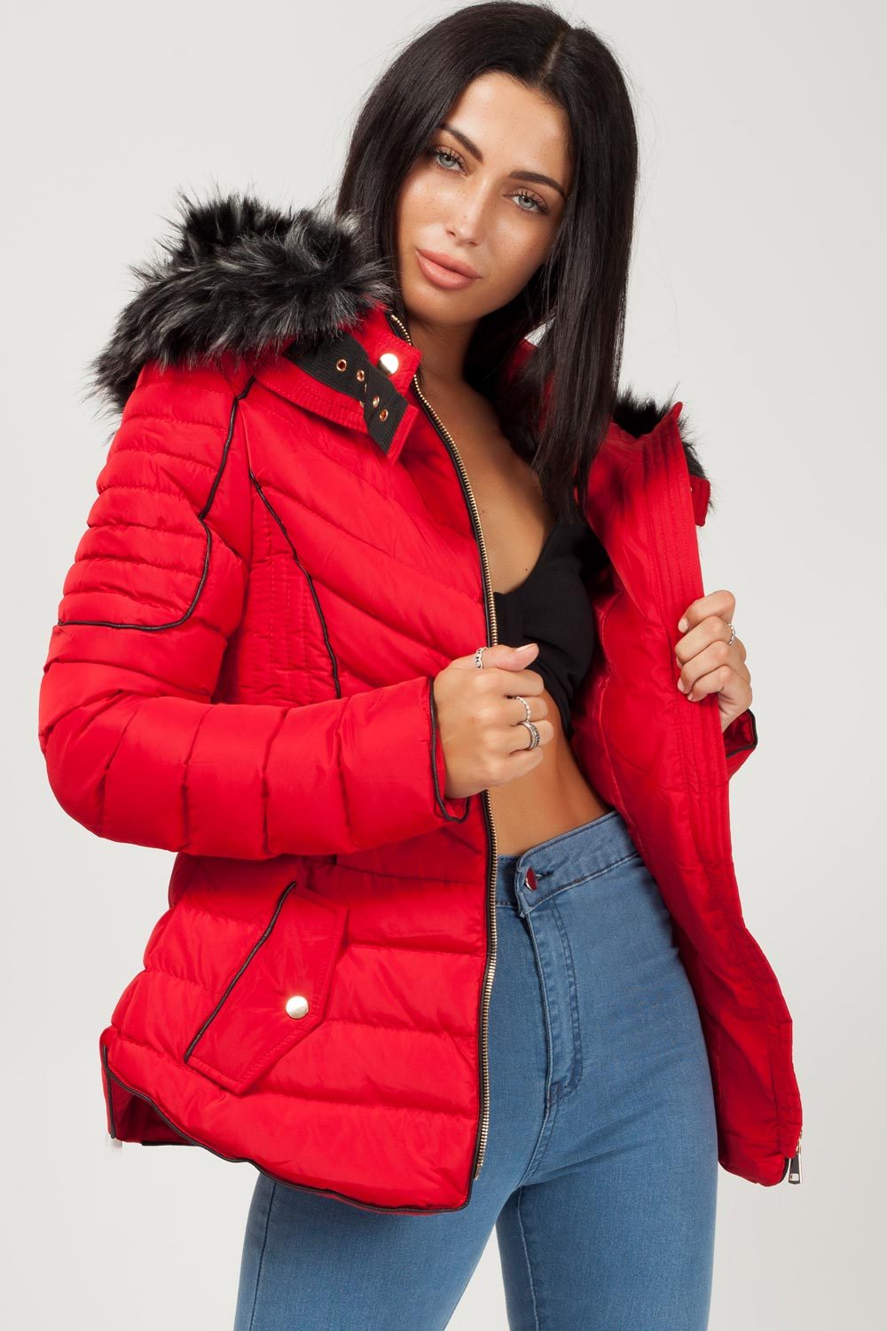 red puffer coat with chunky faux fur hood