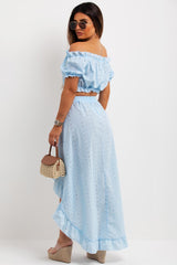 off shoulder broderie anglaise crop top and high low ruffle frilly skirt co ord summer holiday outfit