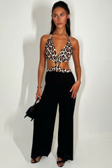 leopard print jumpsuit with cut out sides and wide legs 