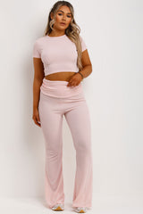 pink fold over trousers flared trousers and crop top two piece set casual summer outfit