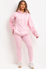 womens oversized hoodie with ruched gathered sleeves and leggings two piece matching loungewear set pink