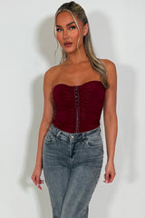 burgundy hook and eye corset top with strapless bardot neckline 