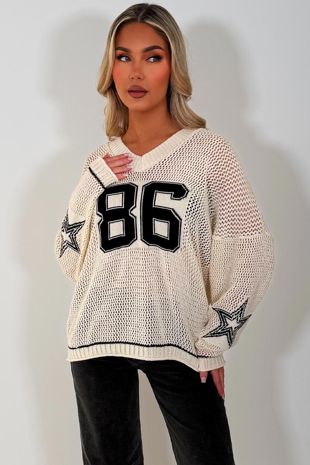 fishnet long sleeve knitted jumper with boston slogan cream styledup 