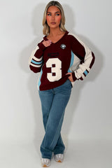 womens oversized sweatshirt athletic baseball jumper styled up 