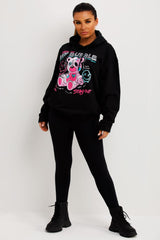 womens black oversized hoodie with teddy bear graphic print