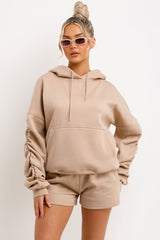 womens short tracksuit oversized ruched sleeve hoodie and shorts lounge set airport outfit