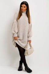 jumper dress with long puff sleeves and roll neck christmas outfit