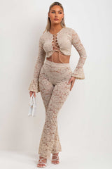 womens beige lace trousers and lace up front going out summer festival crop top