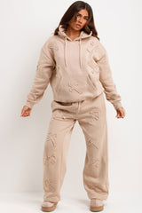 womens oversized hoodie and joggers tracksuit set with distressed cross detail