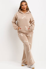 hoodie and joggers tracksuit set with bubble puffed up crosses styled up