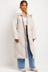 long quilted puffer coat with faux fur collar womens styled up