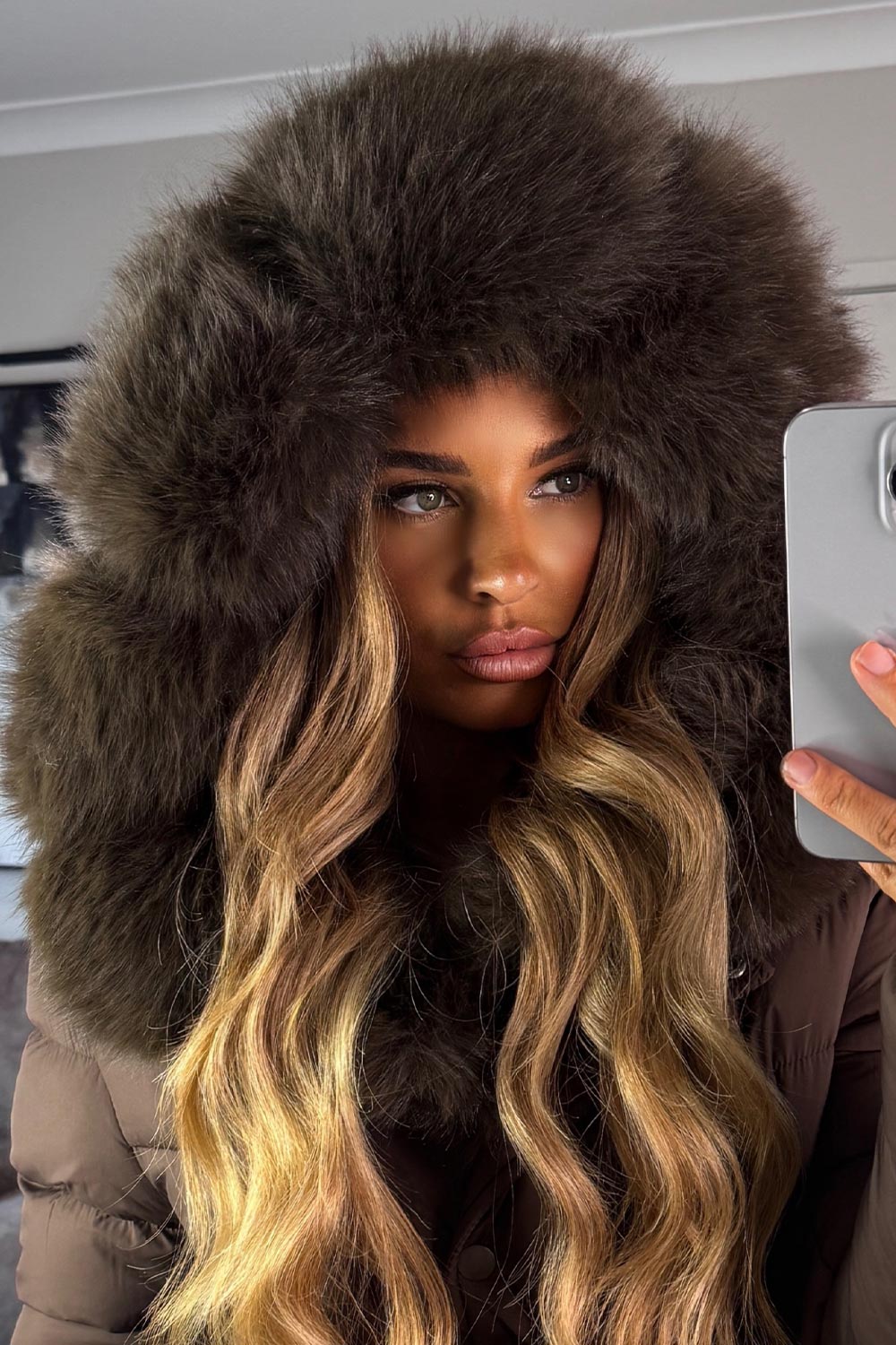 womens long coat for winter with faux fur hood styledup uk
