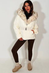 womens faux fur hood puffer padded winter jacket with waist belt outerwear with premium fur hood in white colour 