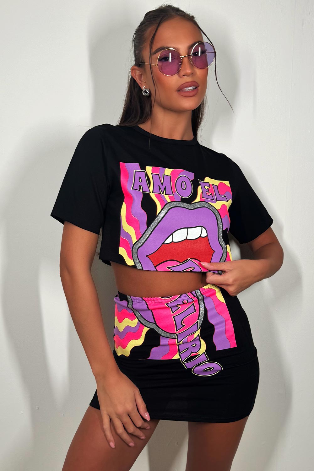 crop t shirt and mini bodycon skirt with neon graphic print co ord two piece summer festival rave outfit
