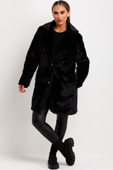 belted fur coat with collar and button fastening 