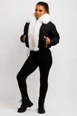 womens black puffer jacket with faux fur trim and collar