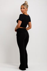 fold detail flare trousers and crop top co ord set black