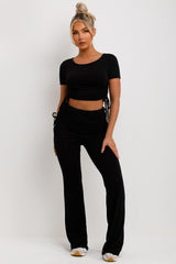 black ruched side fold detail flare trousers and crop top co ord set