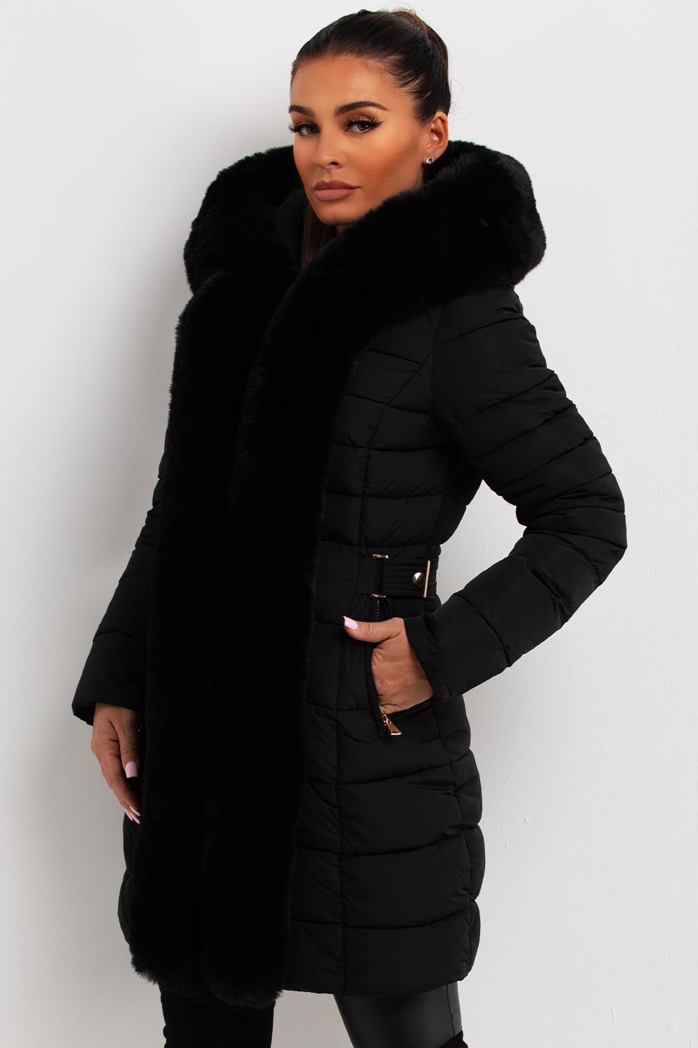 womens long puffer coat with faux fur hood and trim