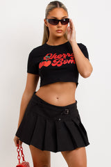 womens baby tee with graphic cherry bomb slogan 