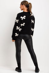 womens knitted jumper with long sleeves bows and diamantes