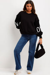 womens knitted sleeve jumper with love slogan