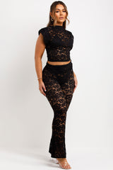 black womens sheer lace trousers and shoulder pad top co ord set