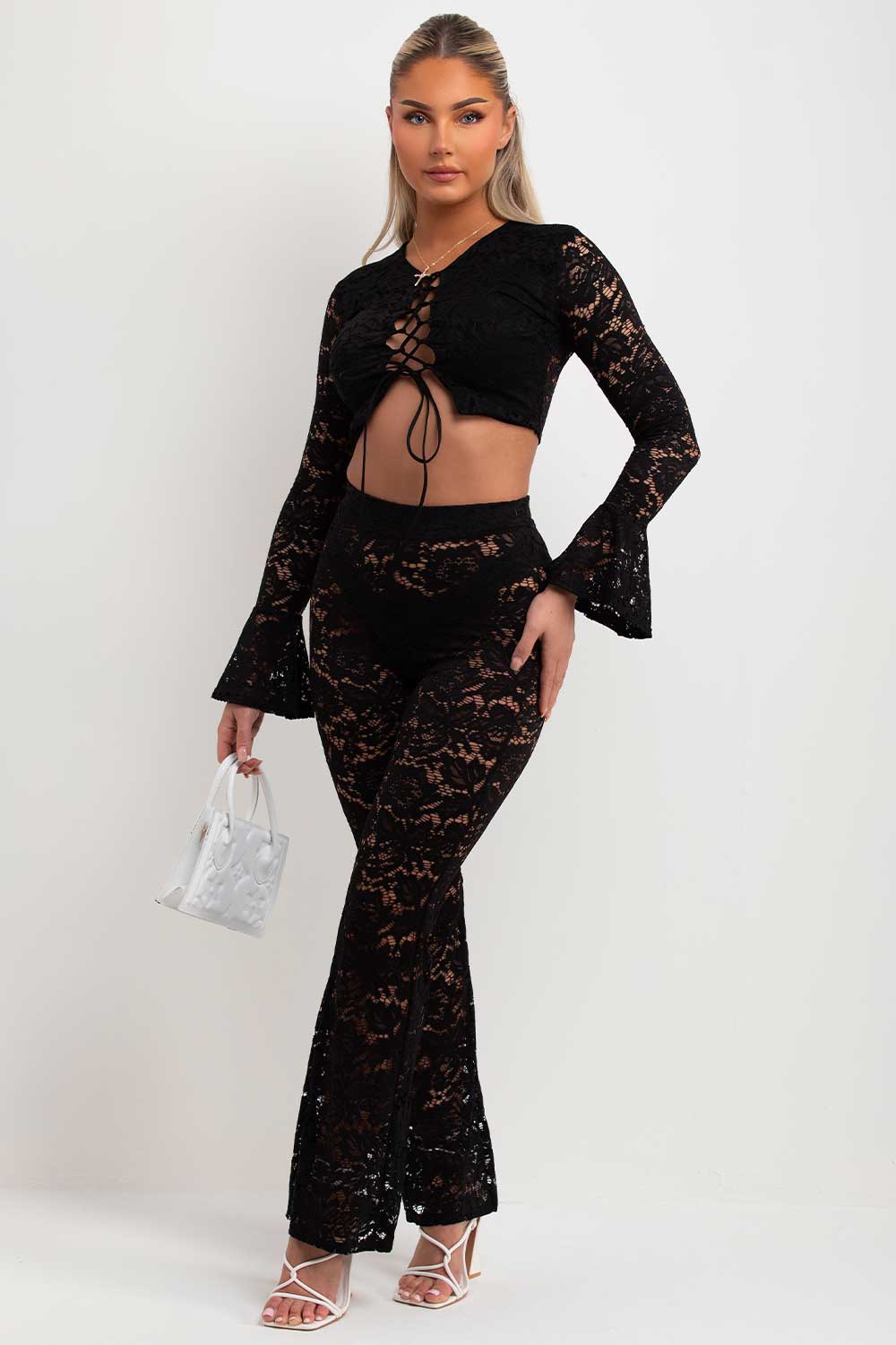 womens black lace up front flare sleeve crop top and skinny flare trousers co ord set