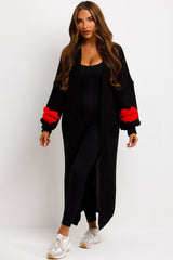 long knitted cardigan with lips detail on sleeves