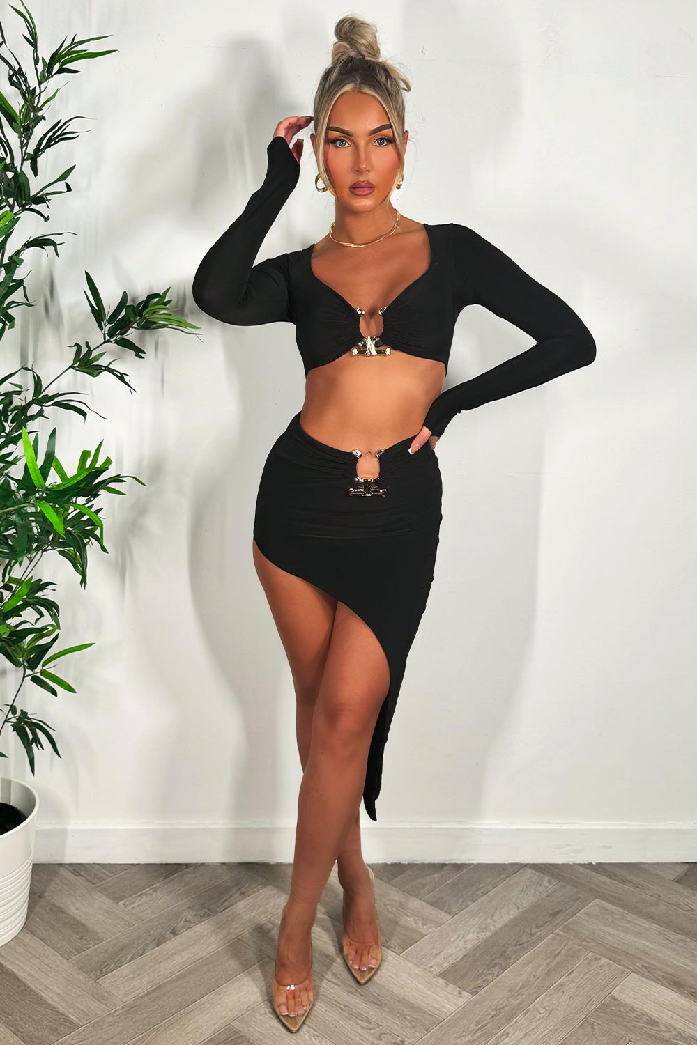 black maxi skirt and long sleeve crop top with gold buckle two piece co ord summer festival holiday outfit