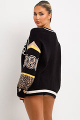 womens long sleeve knitted jumper with teddy bear detail and leopard print sleeves