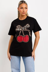 womens black t shirt with cherry print oversized