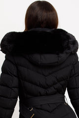 womens black puffer coat with fur hood and belt styled up