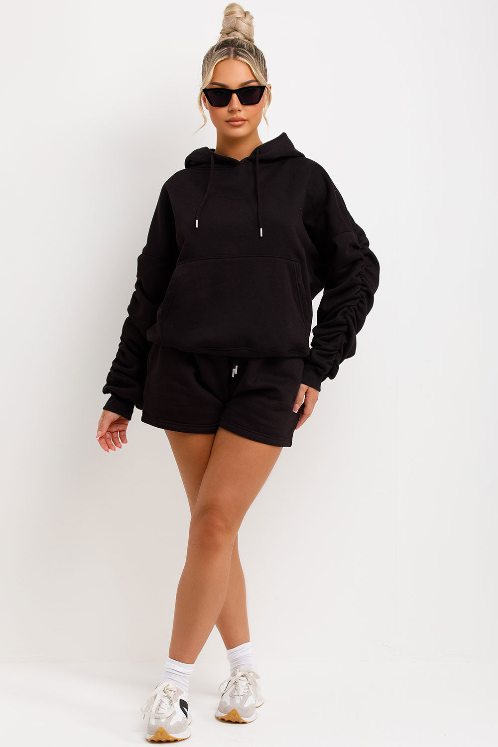 womens short tracksuit oversized ruched sleeve hoodie and shorts lounge set airport outfit