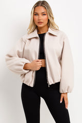 zara womens beige puffed bomber jacket styledup