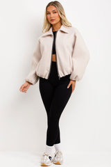 beige puffed bomber jacket with double welt pockets long sleeves zara uk for womens