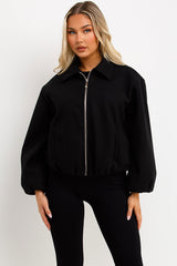 womens black puffed bomber jacket with front double welt pockets zara womens uk 
