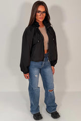 black funnel neck jacket with cinched waist womens uk