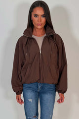 brown funnel neck jacket with cinched waist womens uk