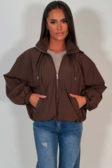 womens brown toggle detail funnel neck jacket with cinched waist cernucci uk