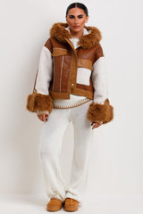 womens faux fur hood faux leather jacket with shearling detail