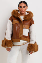 womens faux fur hood faux leather jacket with shearling patches