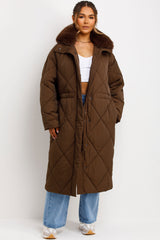 womens long winter coat with faux fur collar and drawstring waist styledup