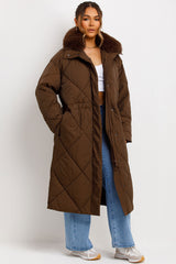 womens quilted padded puffer long coat with faux fur collar styled up