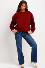 burgundy jumper with knitted sleeves love slogan styledup